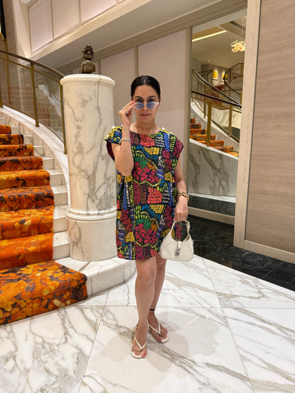 Sneha Tharwani wearing Code White Fresco Shift Dress 2.0 in glaze cotton with statement shoulder buttons