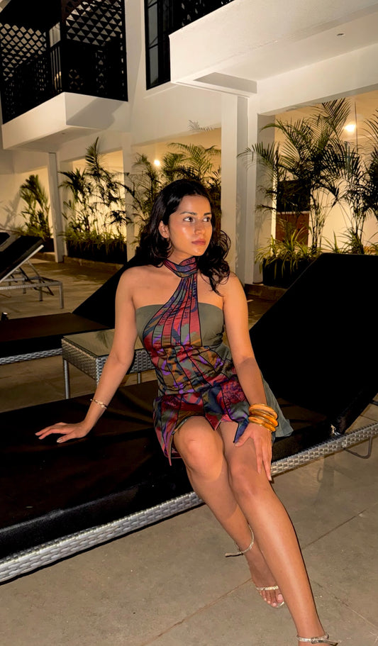 Tanvi Ghalsasi wearing Code White Echo Panel Dress with scarf neckline and jagged hemline