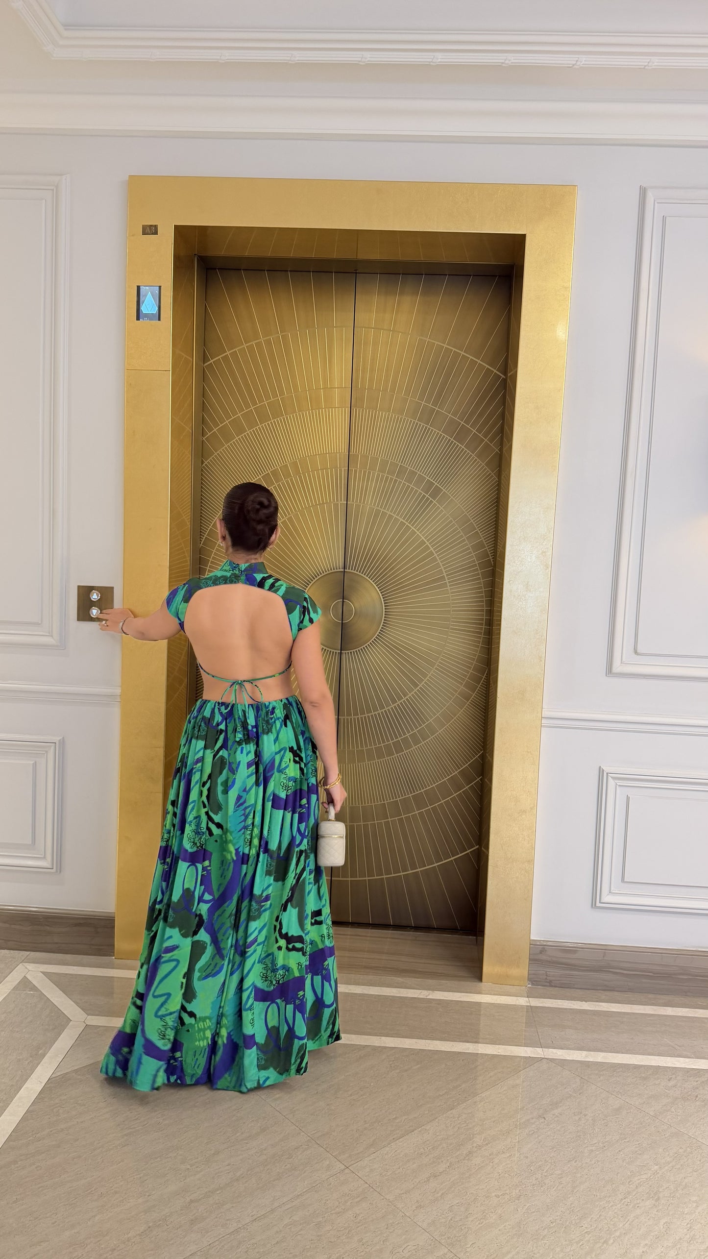 Mansi Lakhwani wearing Code White Noki Maxi Dress with backless design and adjustable string ties - view 2